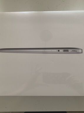 Factory Sealed Apple Silver MacBook Air.  Model No. A1466. 8GB, 128GB. 13.3”.